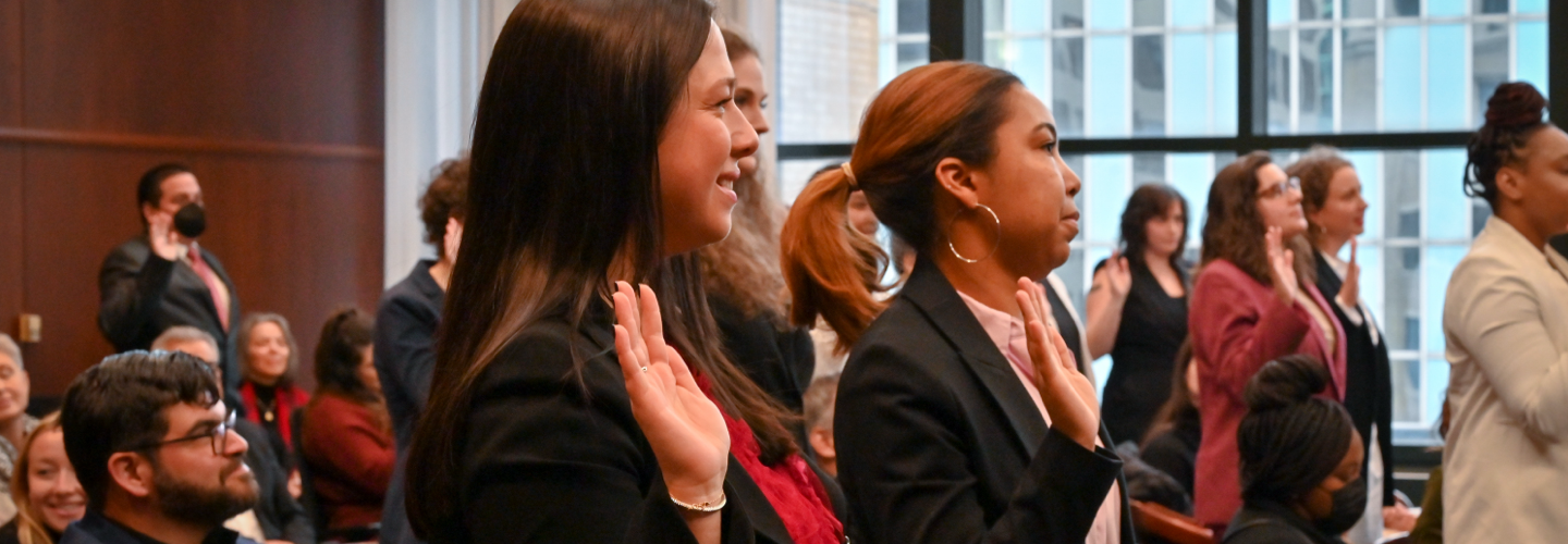 Lawyers raise their hand under oath